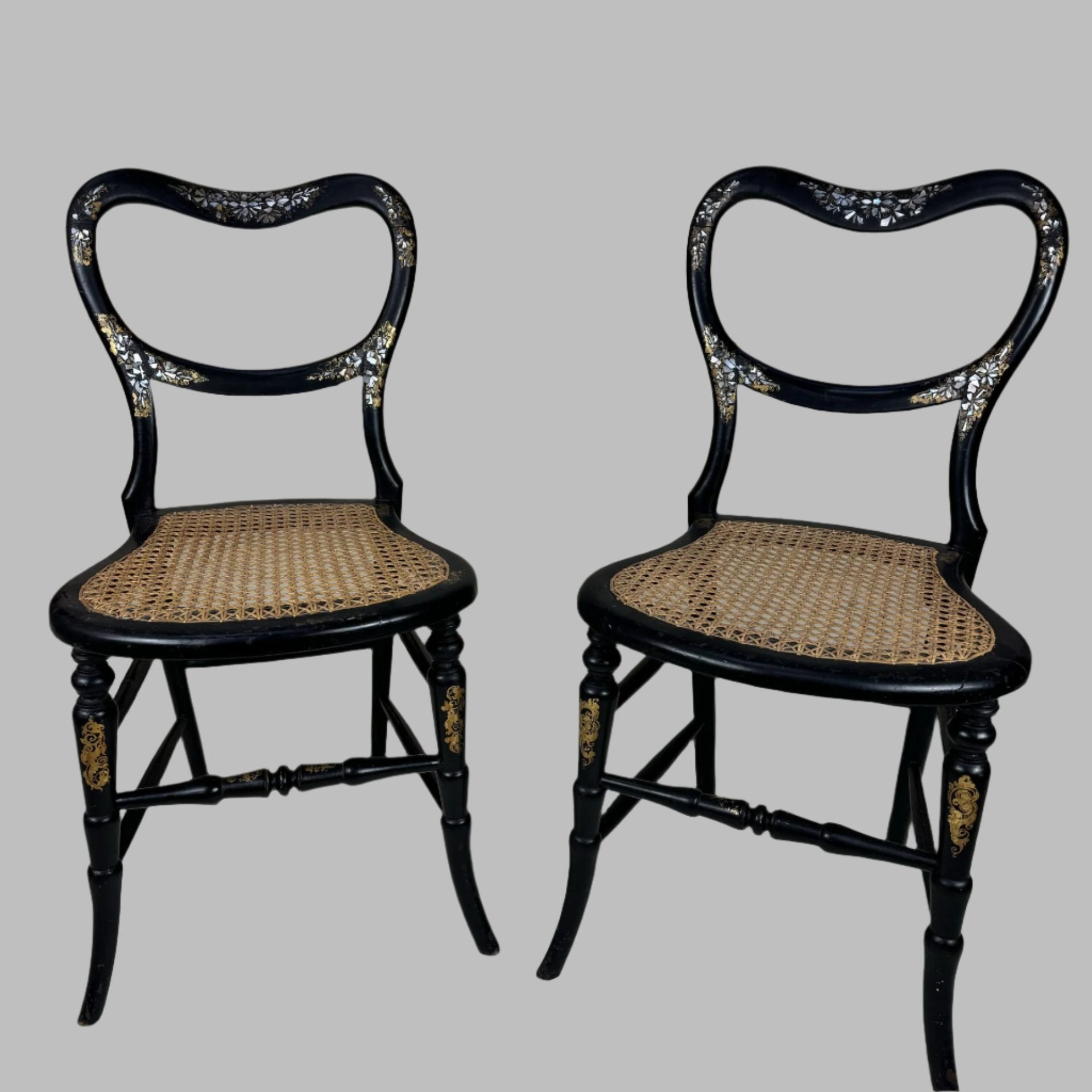 Pair of 19th century ebonised and mother of pearl inlaid chairs
