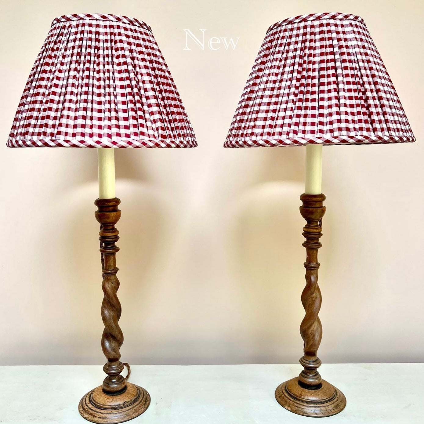 Vintage pair of tall wooden candlestick lamps