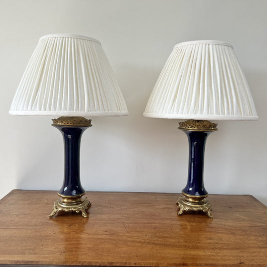 Vintage pair of French brass and blue glass table lamps