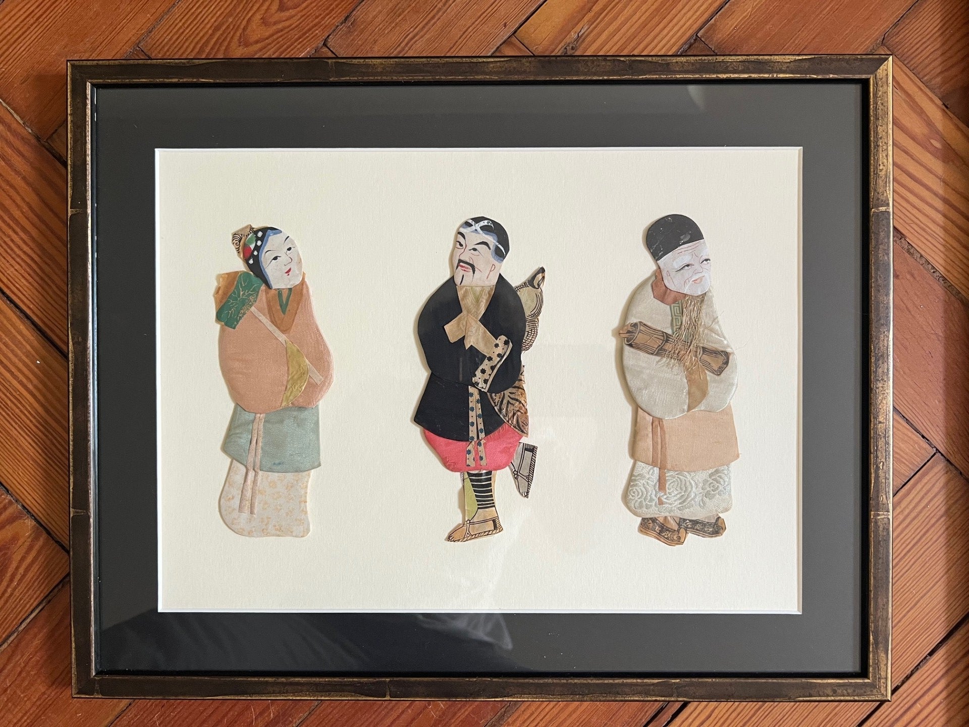 Pair of Chinese decorative framed pictures
